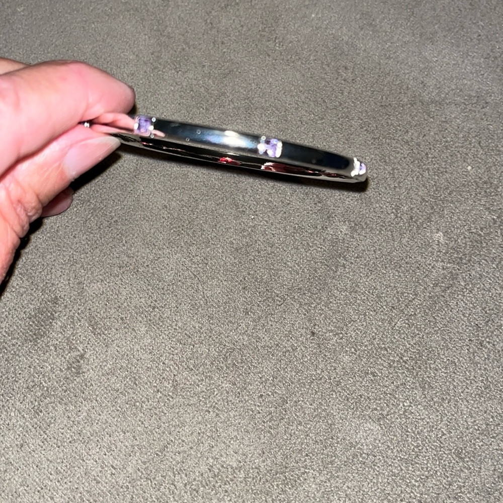 Anne Klein silver tone bangle bracelet with inset rhinestones